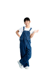 A young girl in blue overalls, standing and smiling at the camera with PNG 