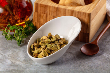 Green dry cardamom heap spices aroma