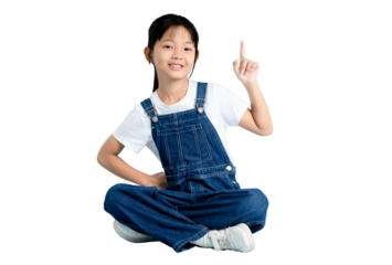 A young girl points upwards, wearing a denim overall and white t-shirt on PNG 