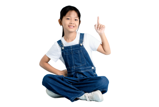 A young girl points upwards, wearing a denim overall and white t-shirt on PNG 