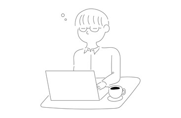 パソコン作業中のメガネの男性