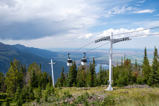 Joseph, Oregon, USA - July 30, 2025: The aerial gondola tram at the top of Mt. Harold. One tram goes up while the next goes down, bringing amazing views of Wallowa Lake and the mountain range.