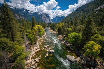 Aerial View Of River Winding Through Mountain Valley