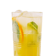 Refreshing citrus drink with ice and mint leaves in clear glass