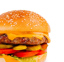 Juicy burger with cheese, lettuce, and pickles on a sesame seed bun