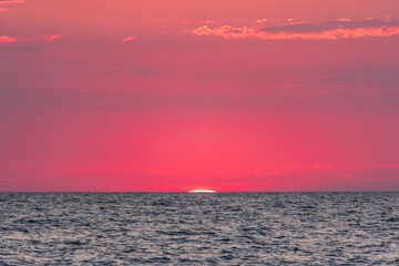 Beautiful red and orange sunrise over the sea.