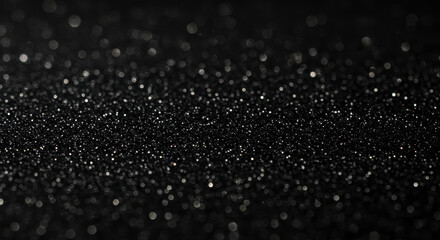 Fototapeta premium Close Up Macro Shot of Fine Glitter Particles Scattered Across a Dark Surface