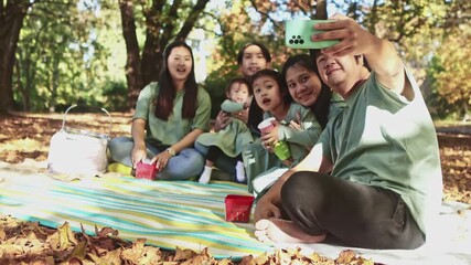 Asian family enjoying autumn picnic in New Zealand