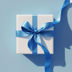 White gift box with blue satin ribbon and bow on blue background blue ribbon