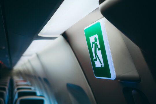 Aircraft cabin safety with illuminated exit sign