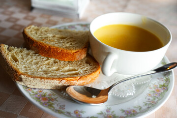 Breakfast with Toast and Corn Soup on Cafe Table