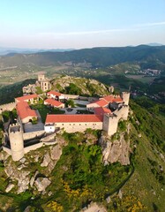 Obraz premium Aerial view of a castle perched atop a hill