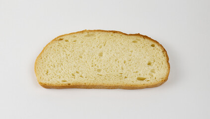 Freshly sliced white bread on a clean surface