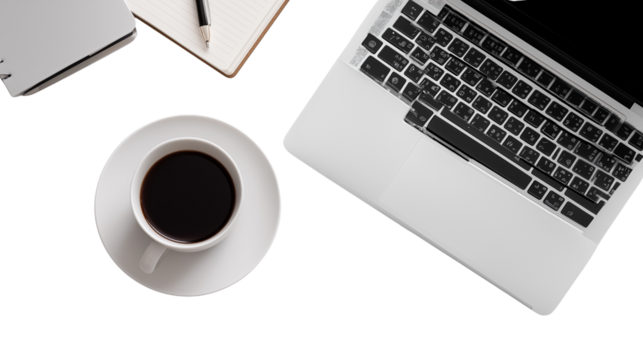 laptop on white desk with notebook and coffee cup