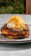 Golden potato rosti crowned with crisp nest, mysterious brunch allure, Swiss Autumn Festival delicacy, culinary art layering