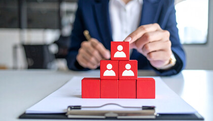 Strategic leadership, building a strong team by using wooden blocks
