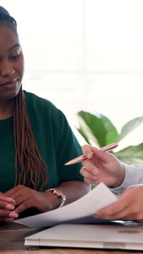 Vertical video: Black woman receiving documents signing contract shaking hands calling at office