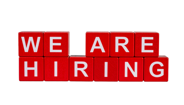 We Are Hiring message with red block letters on a white background, conveying a recruitment message
