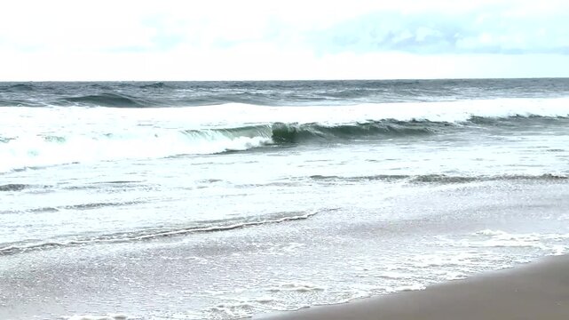 Storm Waves From Hurricane Erin Rolling on to a Long Island Beach the Day before the storm arrives