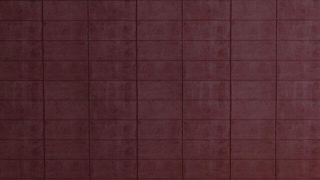 Dark red maroon tufted upholstered wall paneling creating a seamless geometric grid pattern for a luxury interior background