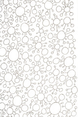 Close up of hand drawn doodle pen circle spirals and spots and dots on white background
