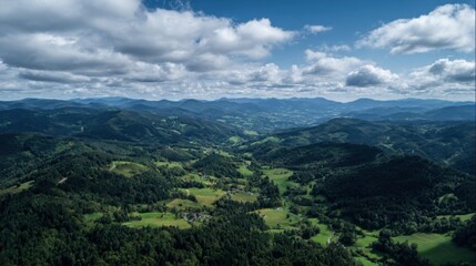 Fototapeta premium Aerial view of lush green mountains and valleys nature landscape
