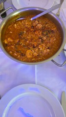 rice with octopus and shrimp in a paella