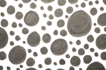 Close up of hand drawn doodle pen circle spirals and spots and dots on white background