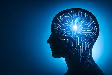 Obraz premium Human head silhouette with glowing circuit brain