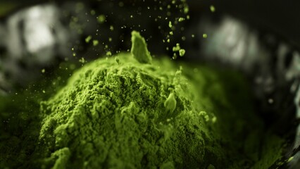 Freeze Motion Detail Shot of Sprinkling Matcha Powder