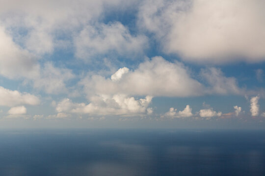 Blue sea under a partly cloudy sky. Stromboli Island, Sicily, Italy