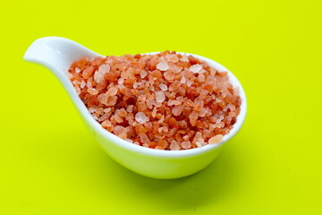 Pink Himalayan salt, Natural pink salt grains used for cooking.