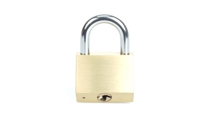 Naklejka premium Brass padlock on white background