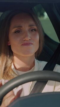 Upset woman being late to work because of traffic jam