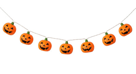 Festive halloween pumpkin string lights with carved faces glowing warmly on a transparent background isolated on transparent background