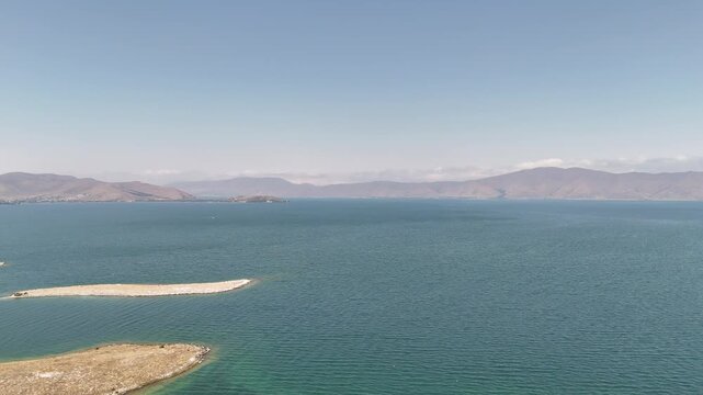 Aerial Drone of Lake Sevan is the largest body of water in both Armenia and the Caucasus region. It is one of the largest freshwater high-altitude (alpine) lakes in Eurasia
