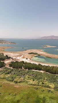Aerial Drone of Lake Sevan is the largest body of water in both Armenia and the Caucasus region. It is one of the largest freshwater high-altitude (alpine) lakes in Eurasia