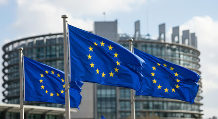 EU Flags Fluttering Before European Parliament Building with Strasbourg.