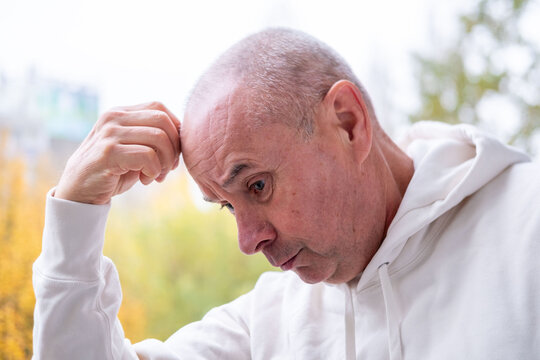 Concerned unhappy senior man with worried face, troubled expression, thinking deeply, sad expression, feeling stressed, mental health, worried thoughts, emotional melancholic adult, reflective mood - Powered by Adobe