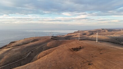Starfish Hill Wind Farm, Cape Jervis, South Australia – Aerial Drone View of Wind Turbines Along Coastal Hills at Sunset, Ocean and Renewable Energy Landscape, Australia Countryside