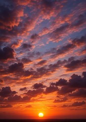 Obraz premium Vibrant sunset with dramatic clouds.