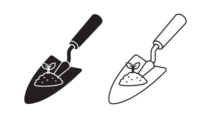 Gardening trowel with seedling and soil