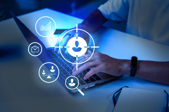 Modern workplace with user analytics and data visualization in focus during late evening hours - Powered by Adobe