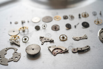 parts of clock mechanism in the watchmaker's workshop