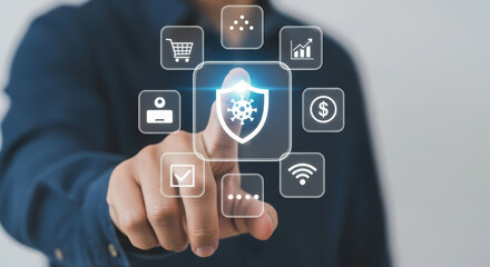 Business professional interacting with digital security icons on a touchscreen, showcasing cybersecurity concepts and technology in a modern workspace environment with a focus on data protection