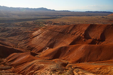 The Red Mountains of Boguta. Mountainous clay terrain. Summer evening time. National Nature Park.