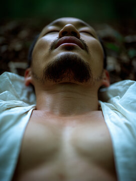 Tranquil Bare Chest Closeup Young Face Forest Vines Solitude Peaceful Human Nature Calm Resting Serene Emotional Expression Tenderness Deep Relaxation Uncensored Skin Health Groomed Hair Wilderness