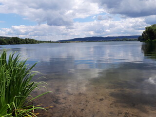 Tranquil Lake under Summer Sky
