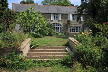 Big stone house in a garden