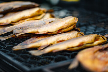 Selection of assorted home made smoked fish on a farmers market in Vilnius, Lithuania.